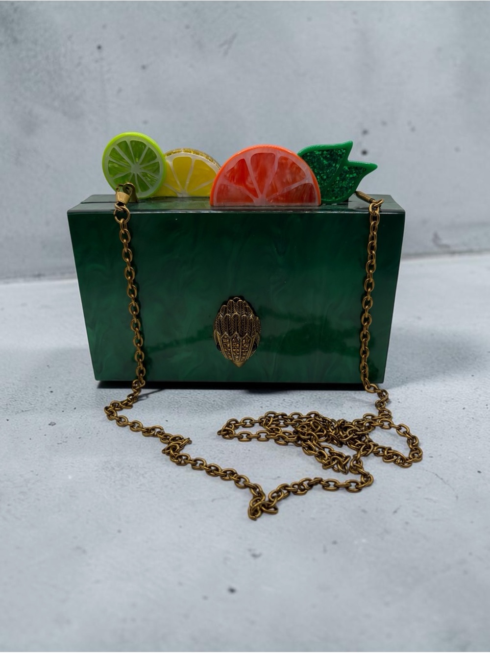 Kurt Geiger London
Fruit Slice Box Clutch in
Green